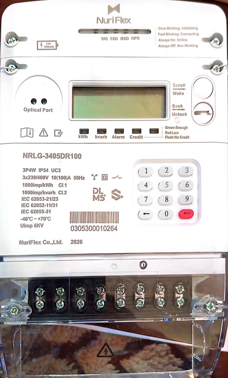 Close-up of three-phase smart energy meter display and keypad